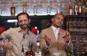 Walshy Fire mixes up a custom cocktail with renowned New-York bartender Steve-Schneider during the BACARDI Legacy Fuel the Hustle roundtable-discussion in San Francisco, Calif. on April 25, 2016. (Josh Edelson/AP Images for BACARDI)