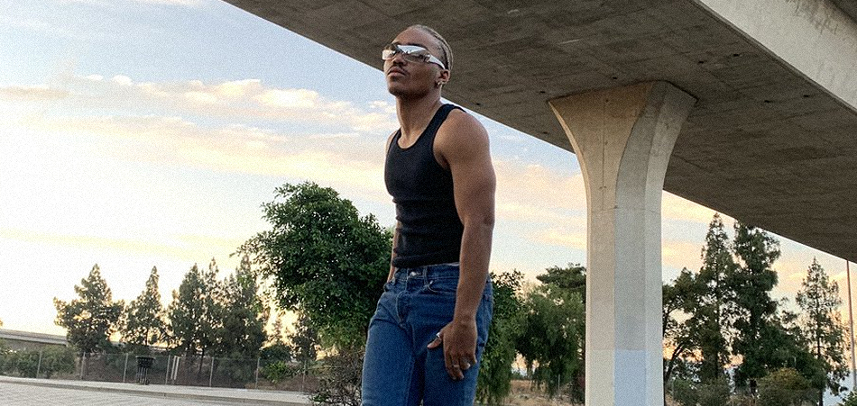 Josh Levi standing under bridge by Blair Caldwell